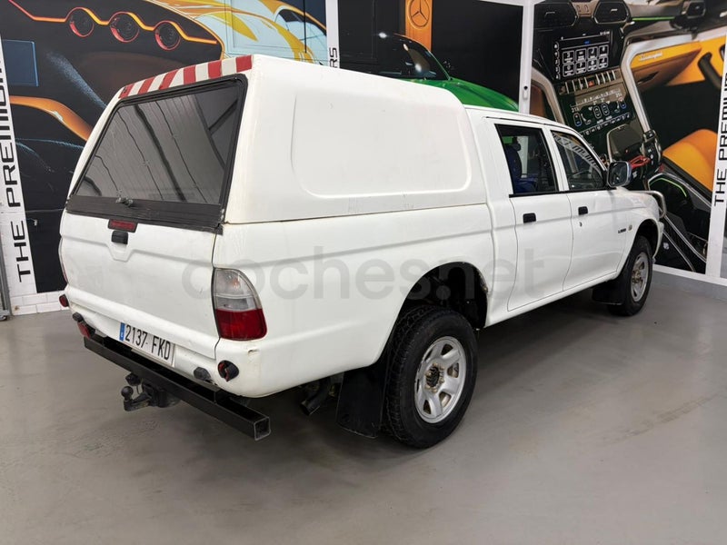 Mitsubishi L200 2007 — photo 7