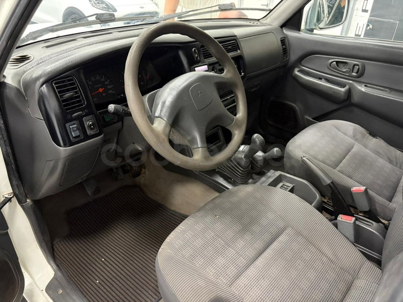 Mitsubishi L200 2007 — photo 8