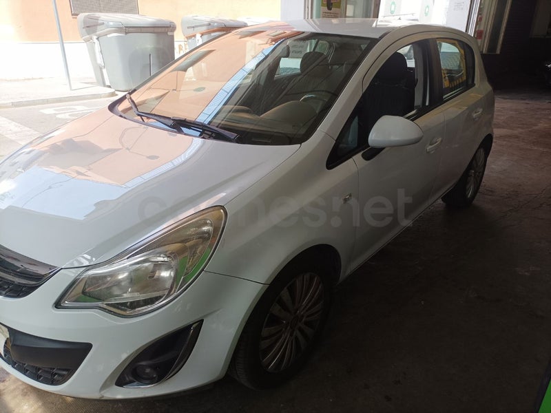 Opel Corsa 2013 — photo 2