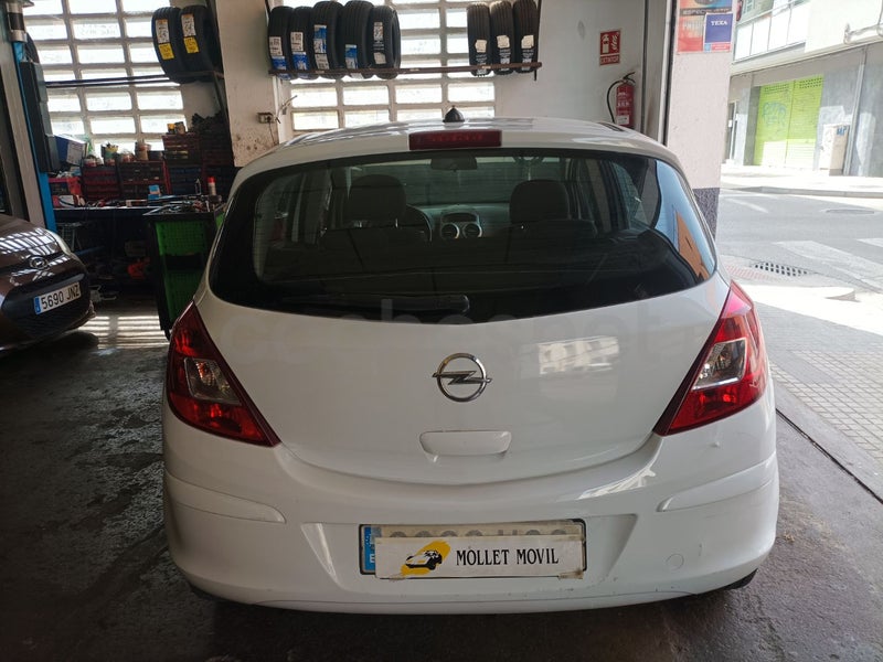 Opel Corsa 2013 — photo 3