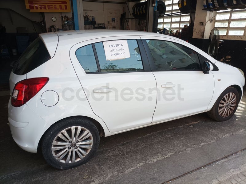 Opel Corsa 2013 — photo 4
