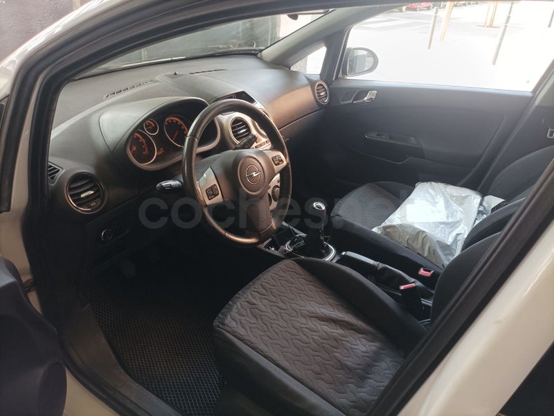 Opel Corsa 2013 — photo 6